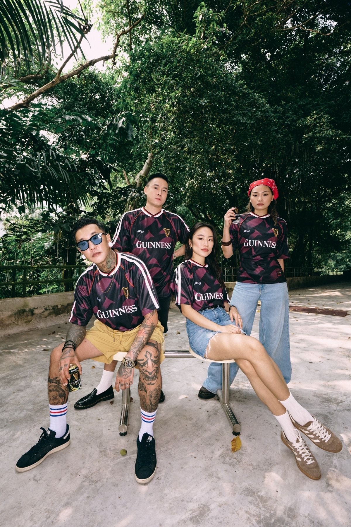 Four models posed among plants