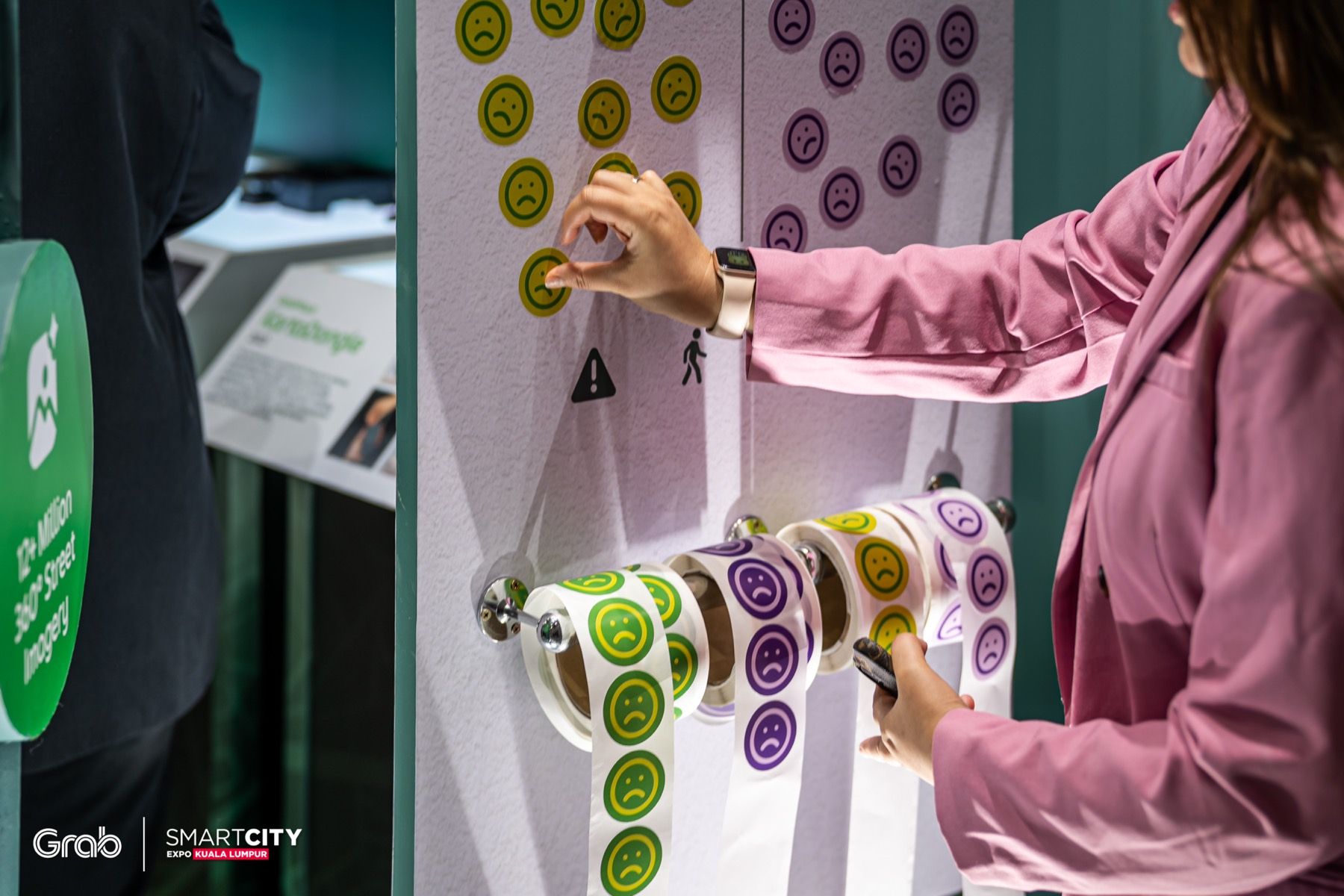 A visitor exploring the hardware display